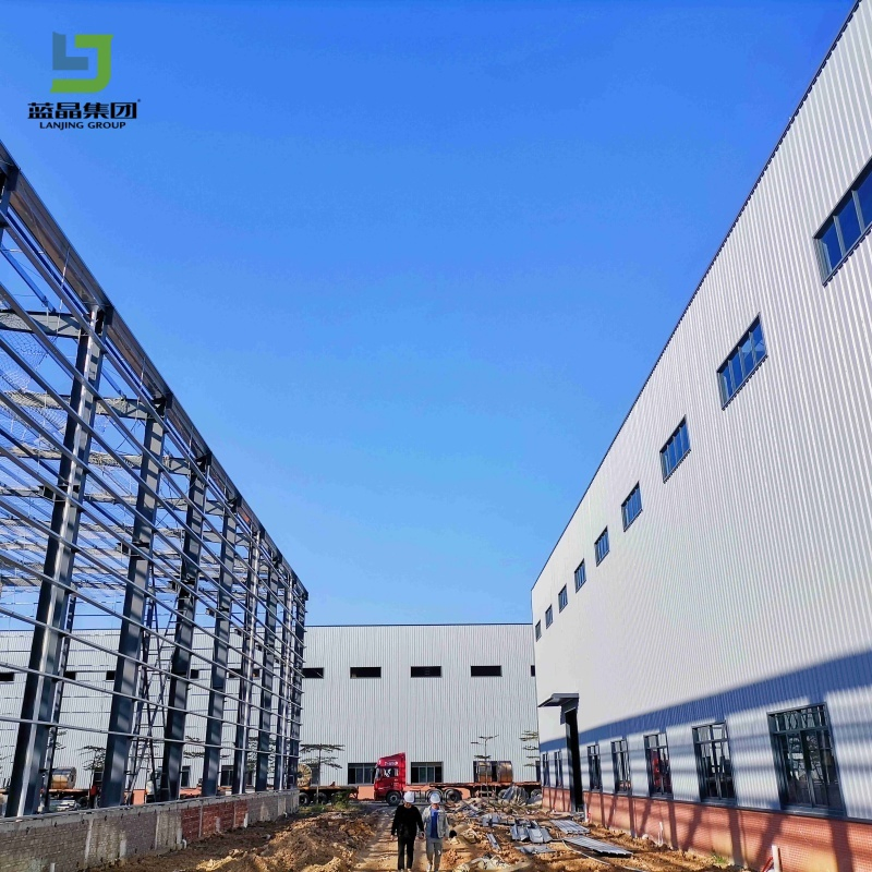 Industrial Portal Preengineering Prefab Prefabricated Light Metal Steel Structure Frame House Building Construction Factory Storage Logistic Workshop Warehouse