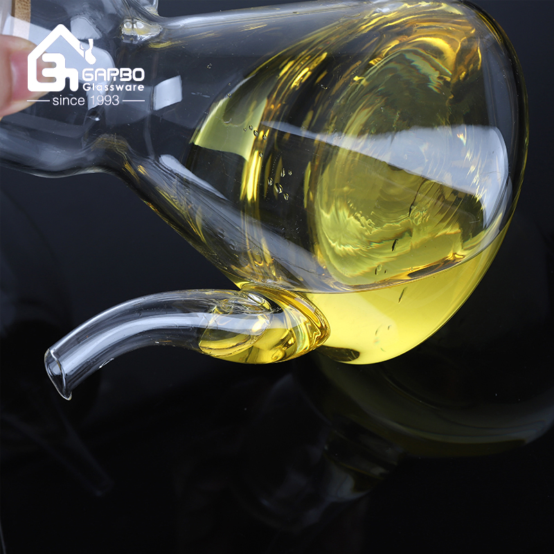 Wholesale Heat Resistant Bamboo Cover Kitchen 600ml Borosilicate Glass Oil Bottle with Silicone Dust Plug