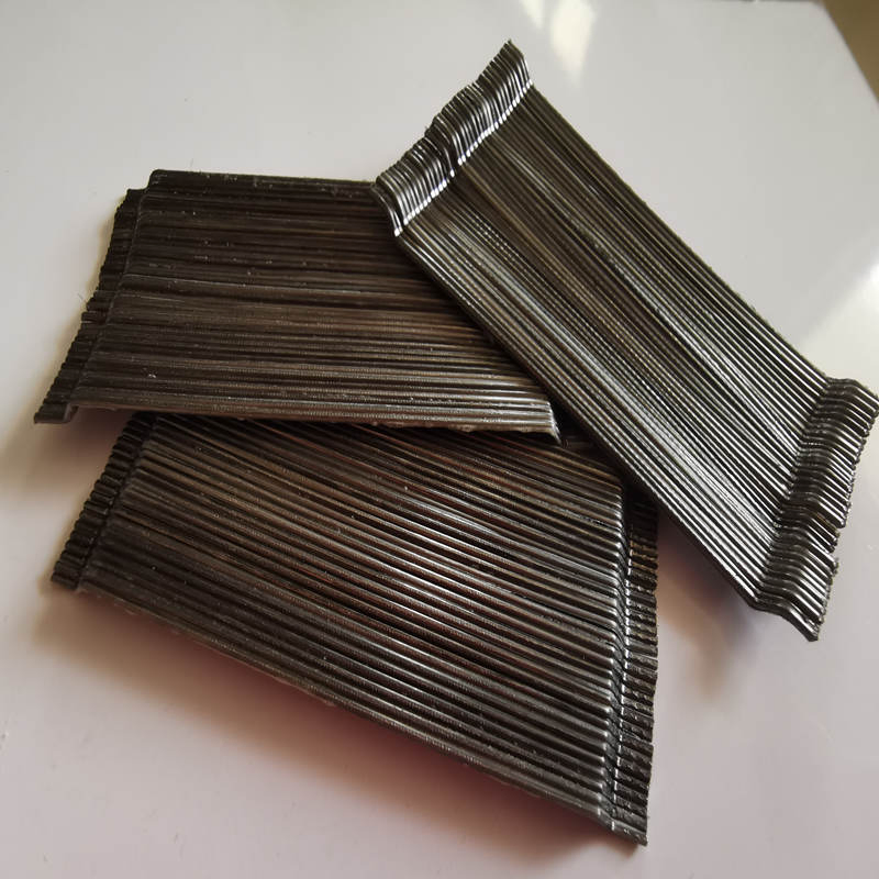 Durability-Enhancing Steel Fiber Reinforcement in Concrete