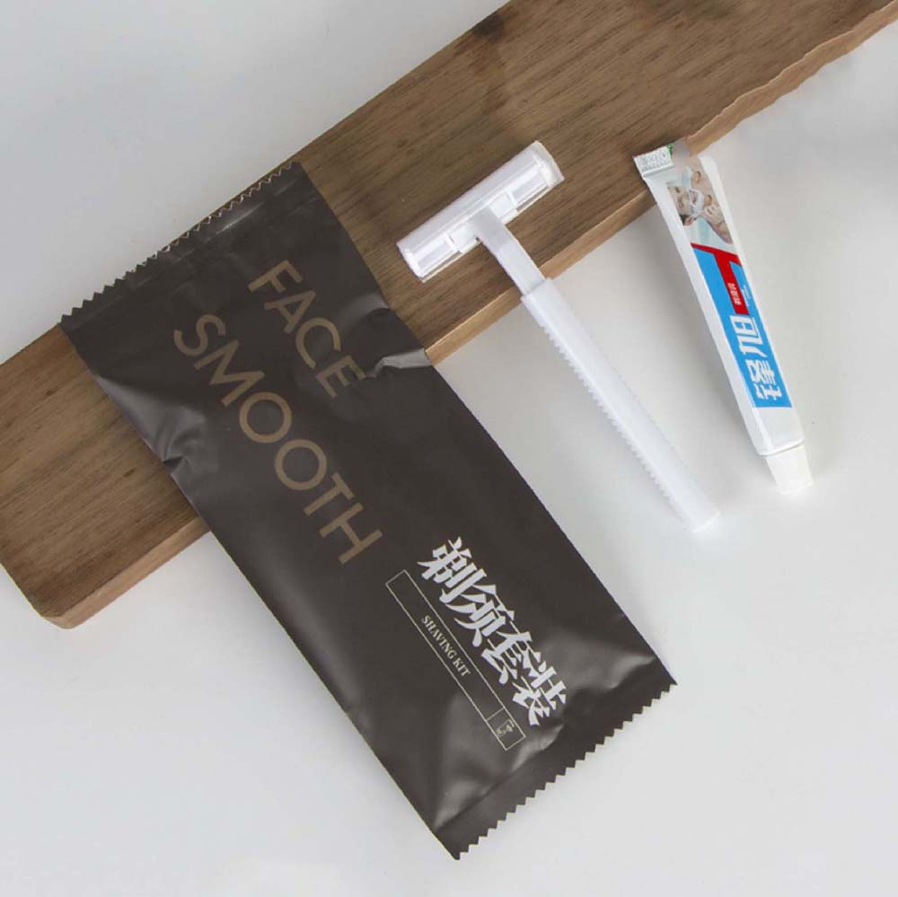 Best Grade Unisex Hotel Supplies Set with Toothpaste/Toothbrush/Razor/Comb/Care Kit/Shower Cap in Brown Package for Male/Female in Guesthouses/Accommodation