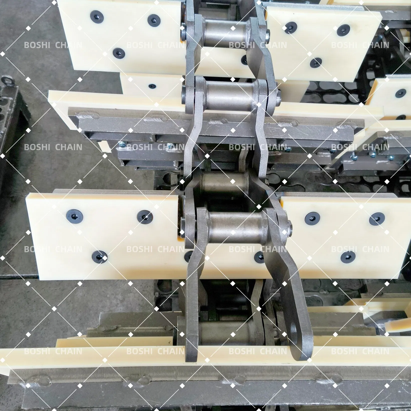 Custom-Welded Bent Plate Chain with Molded Nylon Attachments for Forestry Material Conveyors