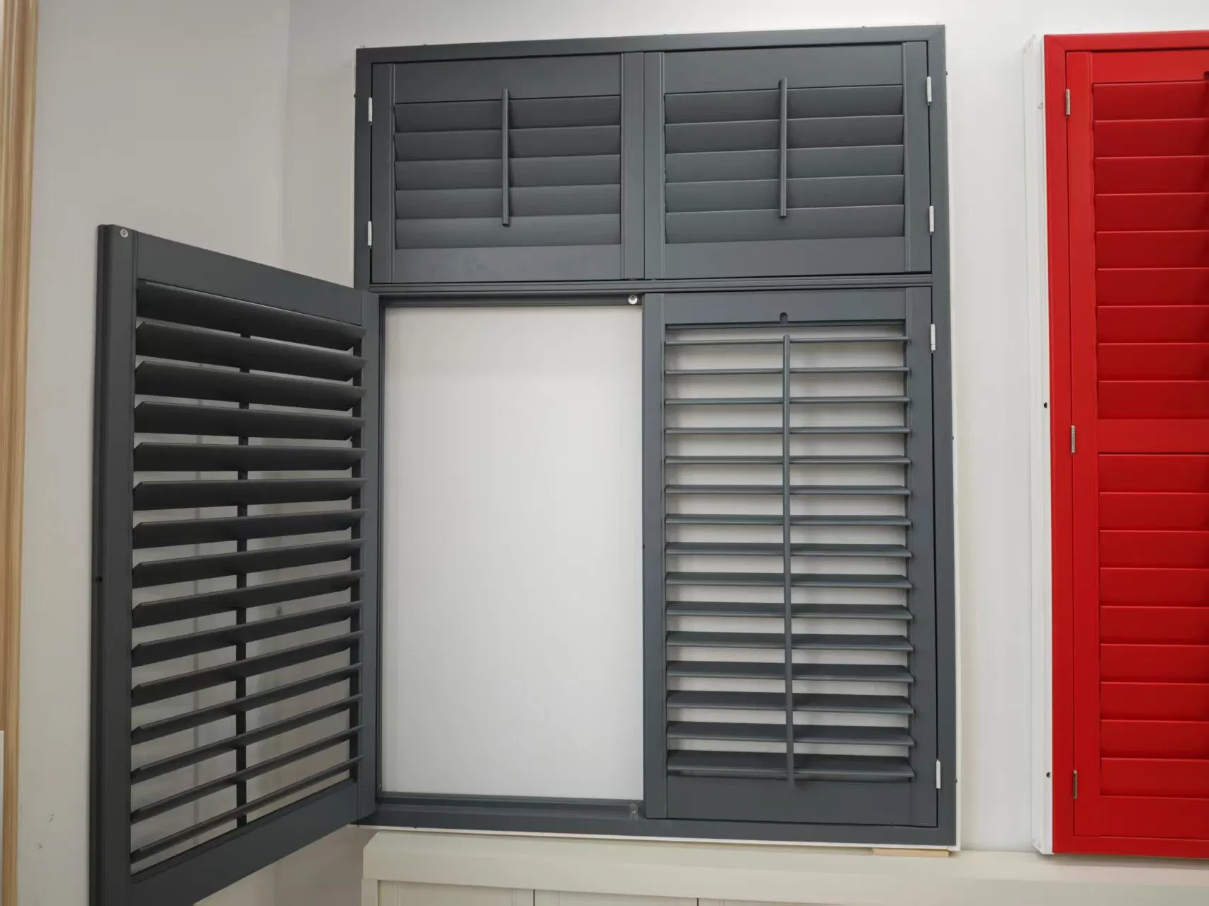 Tier on Tier Window Shutters with a Horizontal Tpost