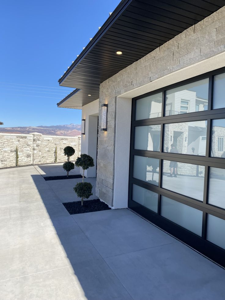 Stylish Glass - Paned Car Garage Door - Let in Natural Light and Elevate Curb Appeal