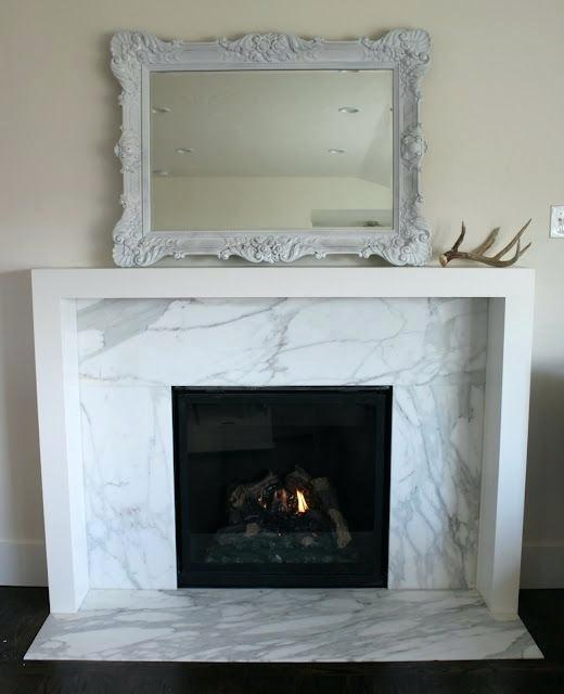 Elegant White Marble Fireplace with Classic Design for Homes