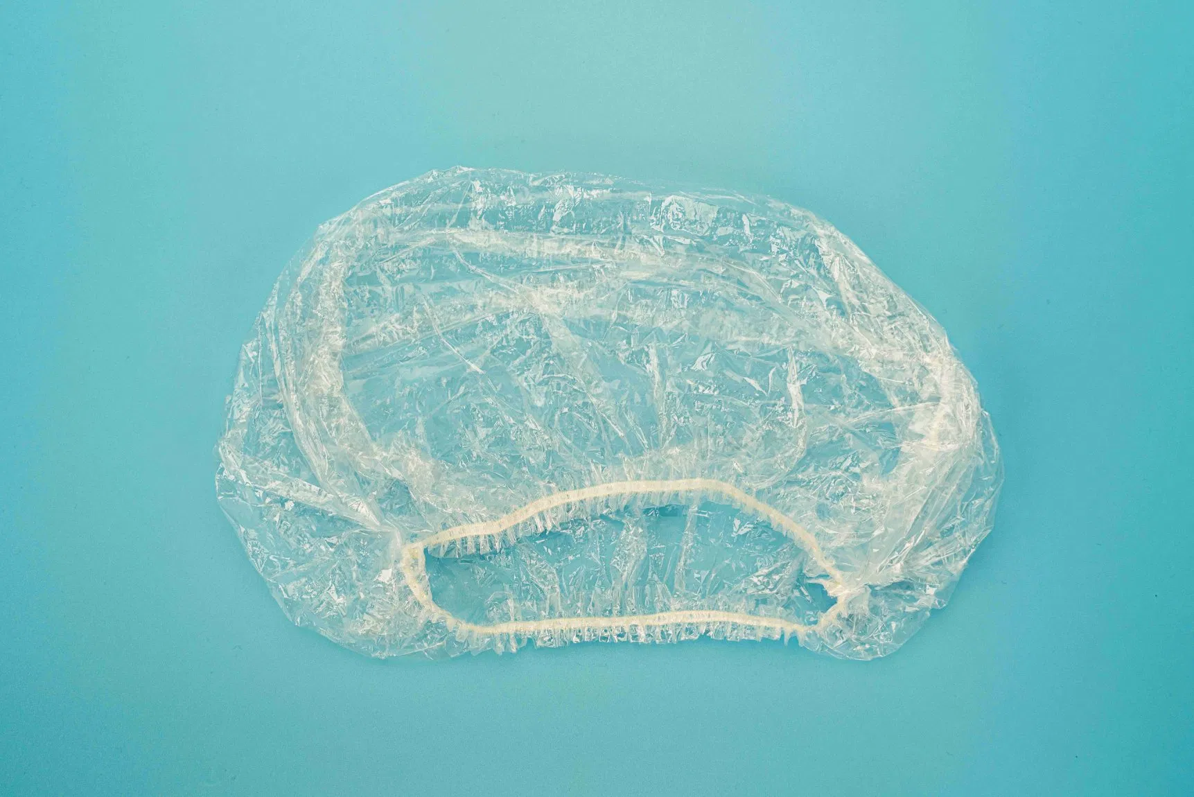 PE Disposable Waterproof Shower Cap for Hotel/Home Use Made by Hand