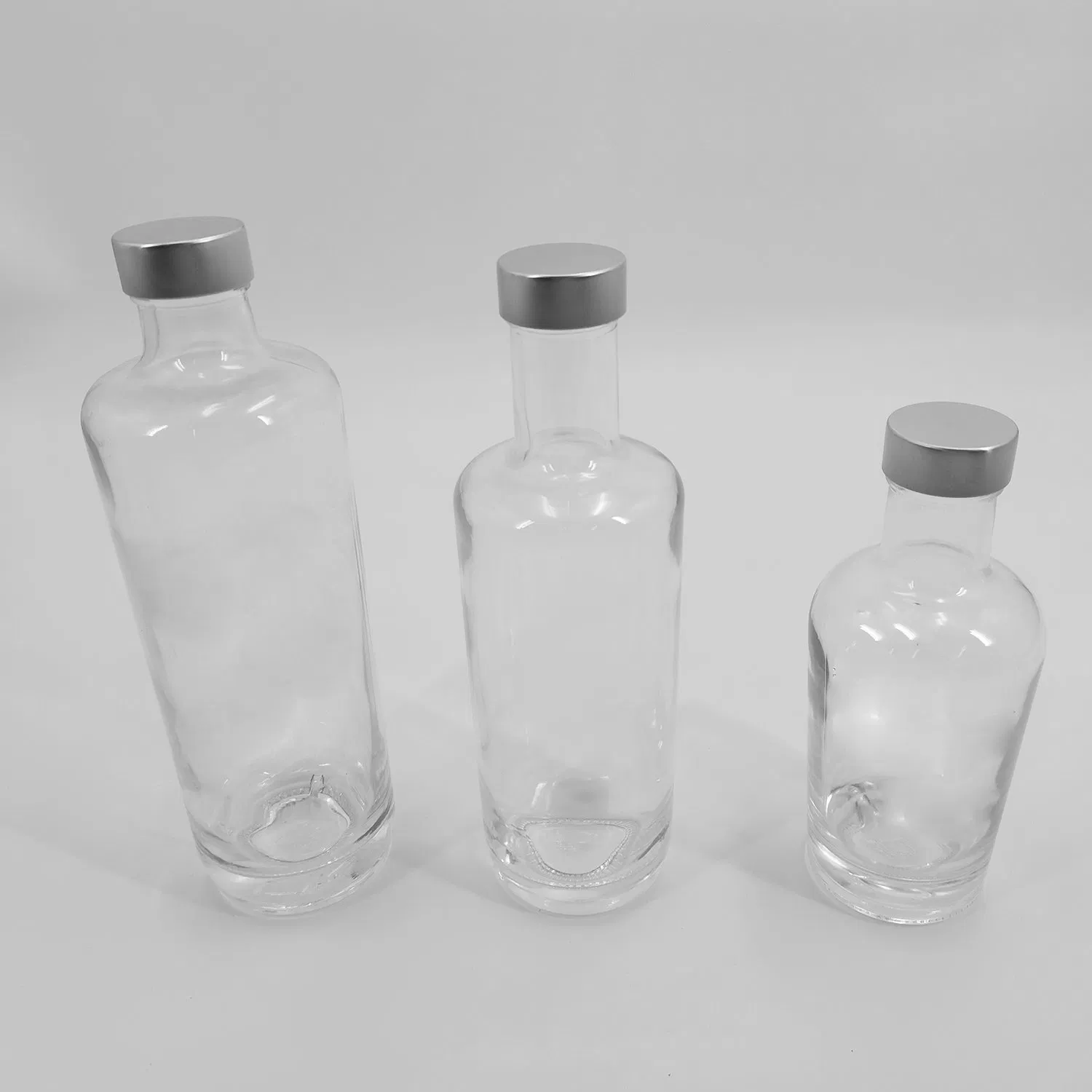 750ml Transparent Round Glass Bottle for Water with Aluminum / Plastic Caps