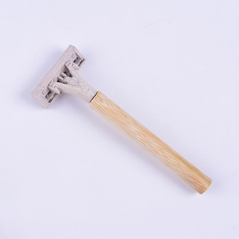 Hotel-Grade Biodegradable Shaver with 3 Blades, Eco-Friendly Wheatgrass Head and Bamboo Handle.