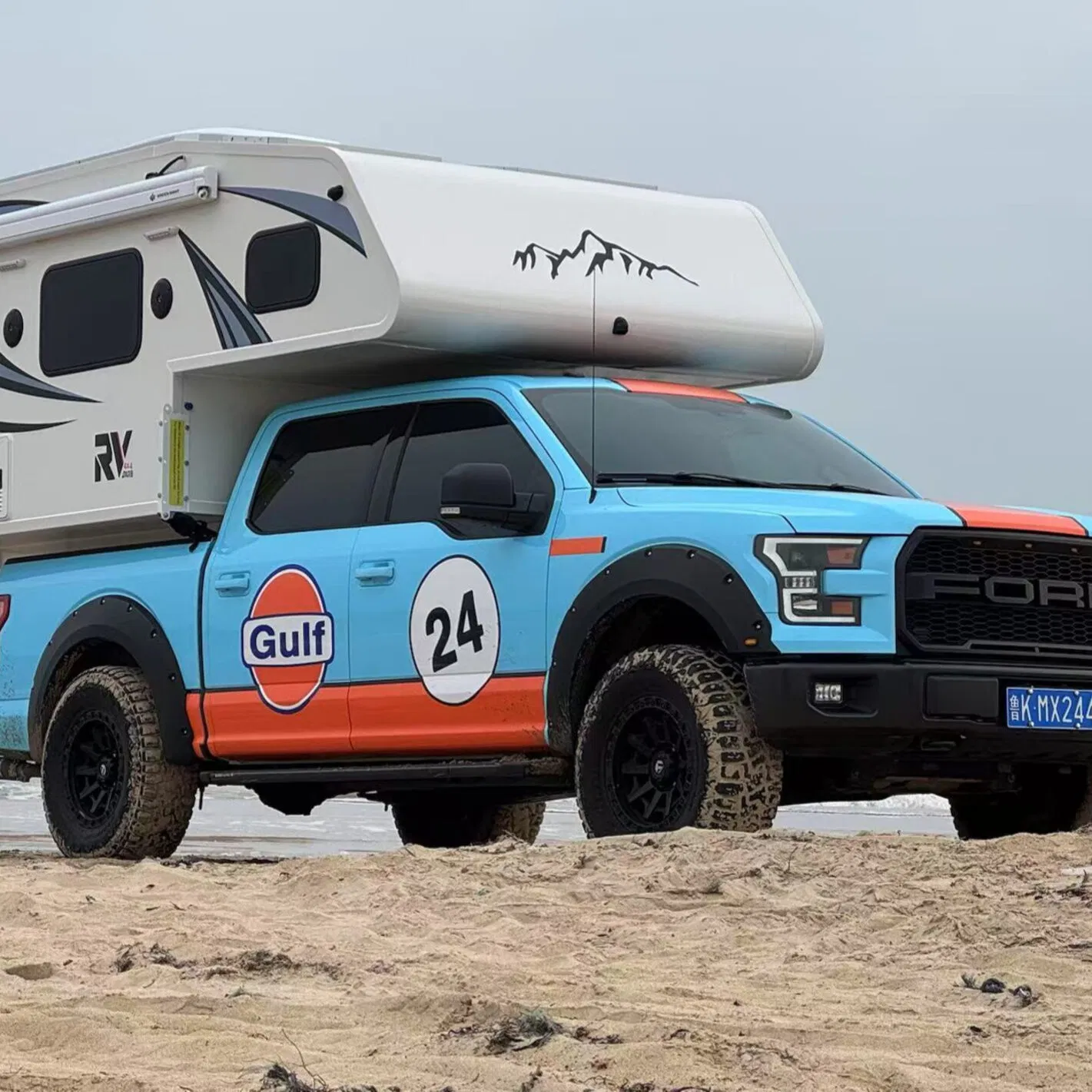 Urban Artist Hard Top Truck Camper Featuring Studio Space with Natural Lighting and Secure Storage