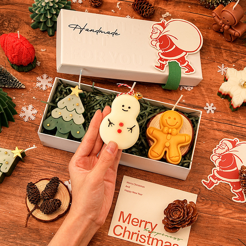 Festive Holiday Candles with Colorful Designs for Gifting