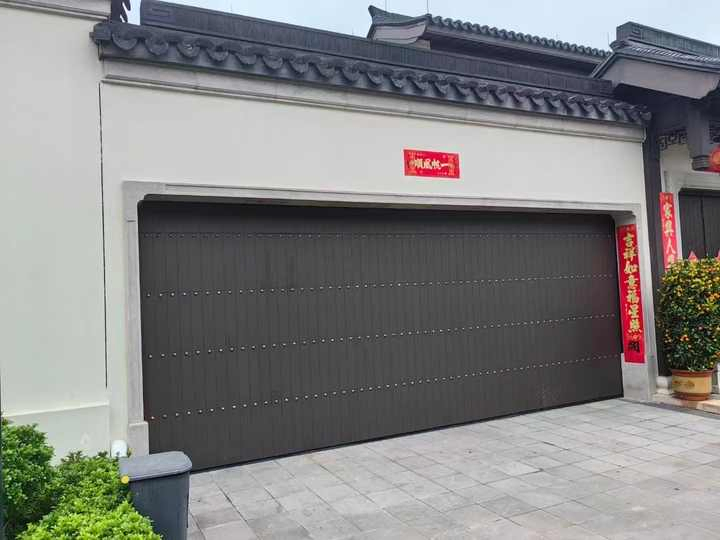 Customized Modern Design Steel Sliding Sectional Garage Door with Automatic Pedestrian Door and Finished Surface
