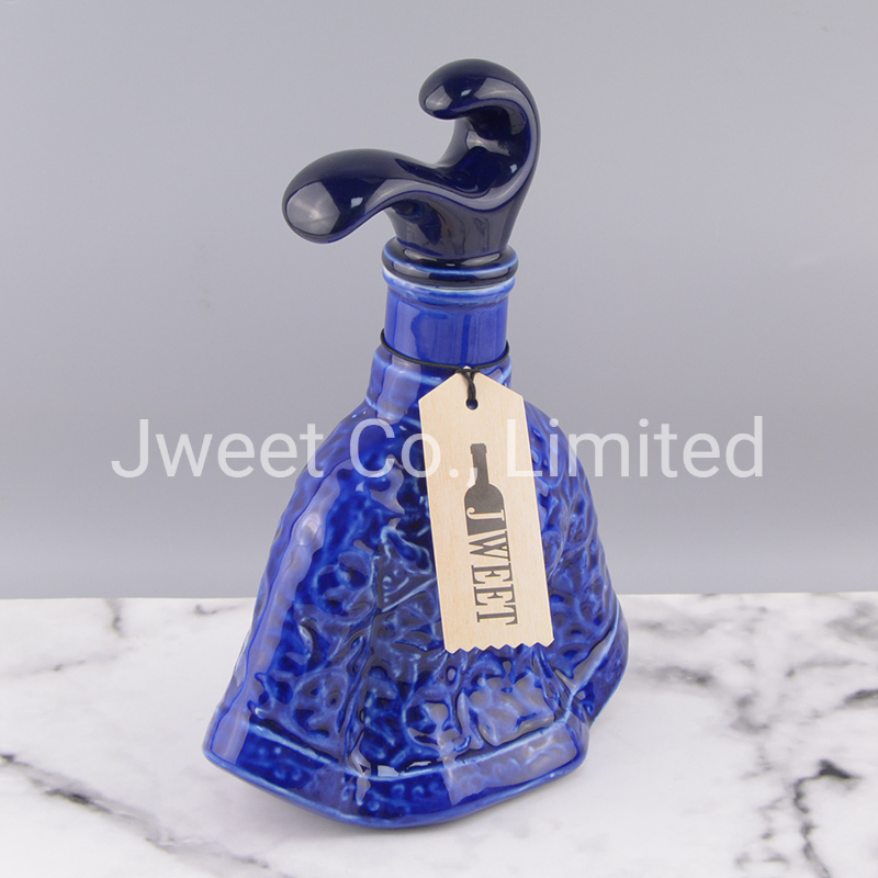 Irregular Shape Glazing Blue Embossed Porcelain Bottle for Wine