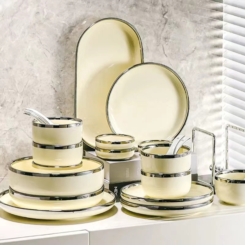 Elegant Light Yellow Ceramic Tableware Set with Silver Trim