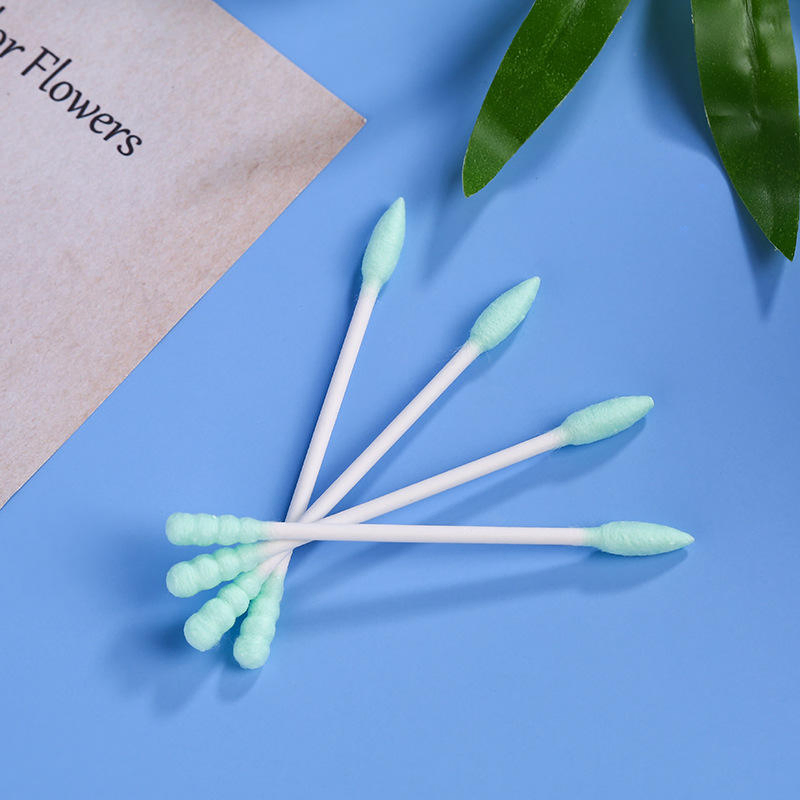 200 Pieces of Cotton Swabs with Green Cotton Tips Packed in a Frosted Square Box.