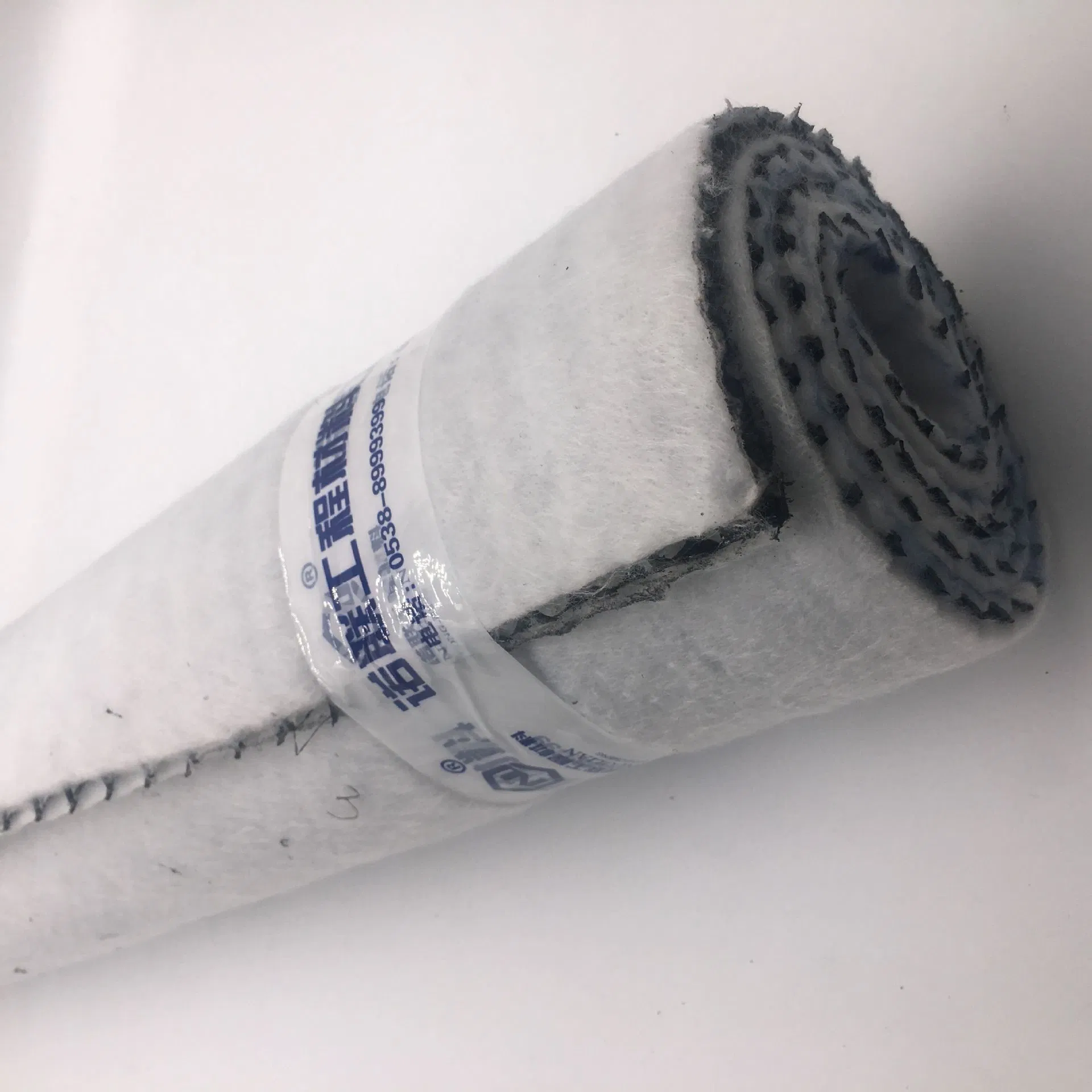 PP/Pet Composite Geotextile Woven Geogrid Building Material Drainage Geonet with Good Price