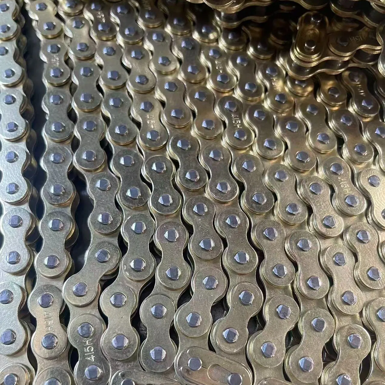 High Quality Precision Hardware Agricultural Motorcycle Roller Gold Chain (415/415H)