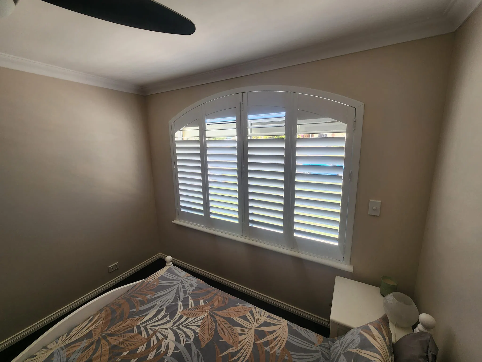 Beautiful Arch and Bay Window Plantation Shutter