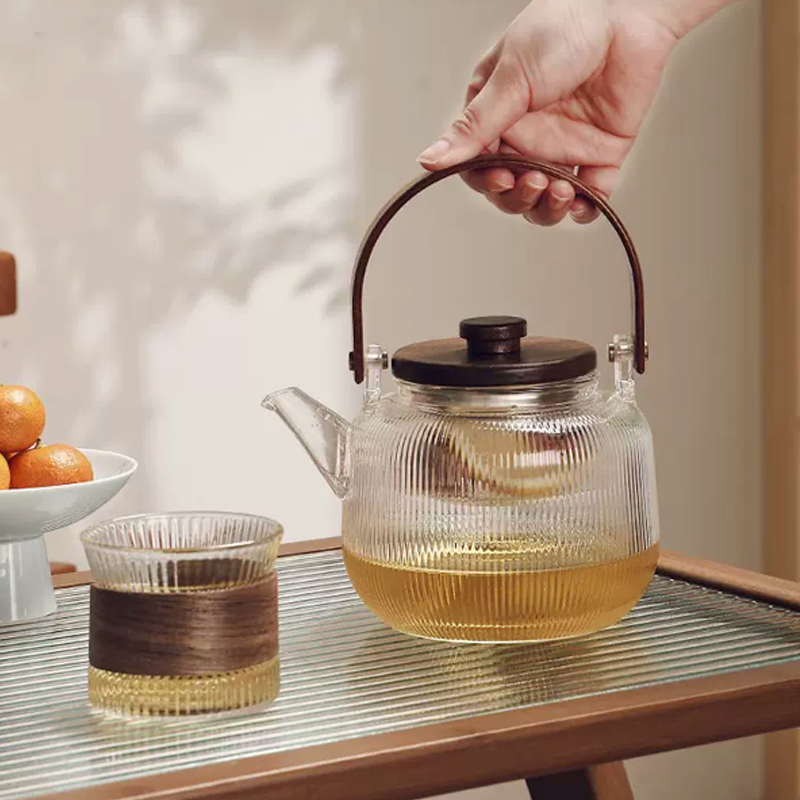 Elegant Glass Teapot with Wooden Handle Designed for Safe Boiling and Brewing