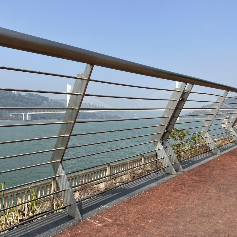 Durable Concrete and Steel Riverside Guardrail Providing Maximum Stability for Flood Control