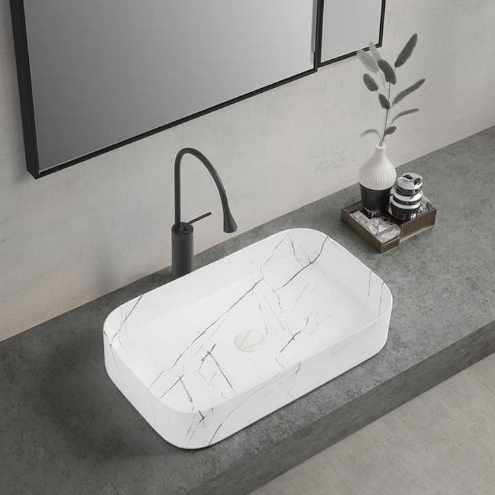 Керамическая раковина 650 мм мраморная глазурь