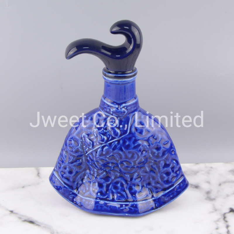 Irregular Shape Glazing Blue Embossed Porcelain Bottle for Wine