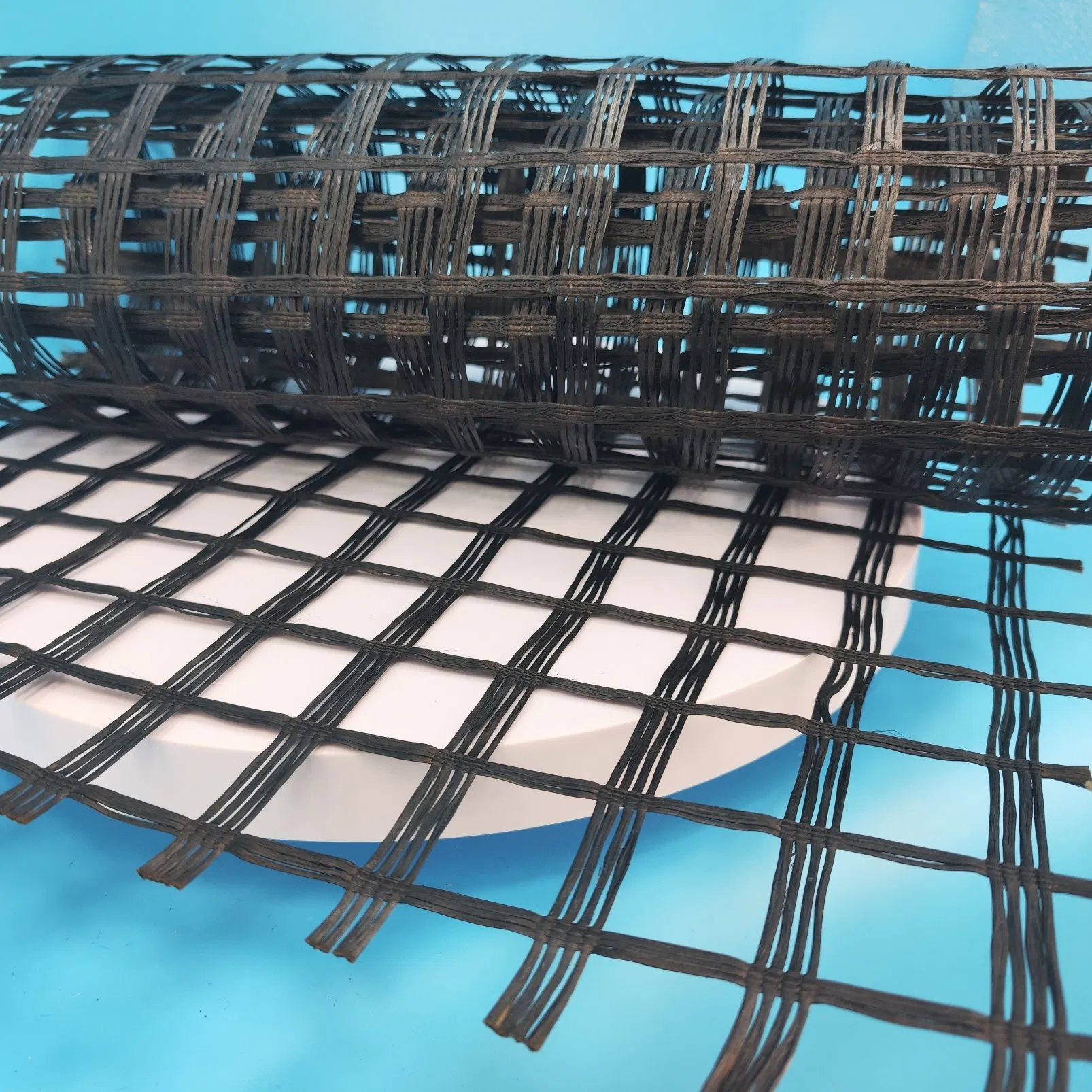 Wholesale 125kN/M Coated Bitumen Fiber Glass Geogrid for Base Stabilization, Asphalt Pavement Reinforcement