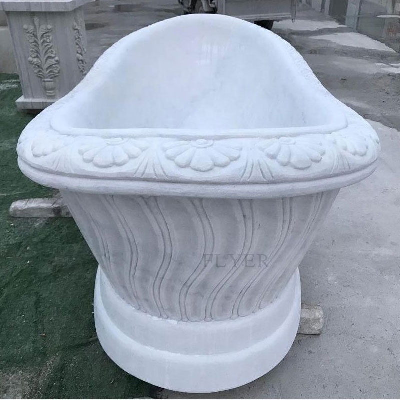 Белая мраморная ванна прямоугольная отдельностоящая