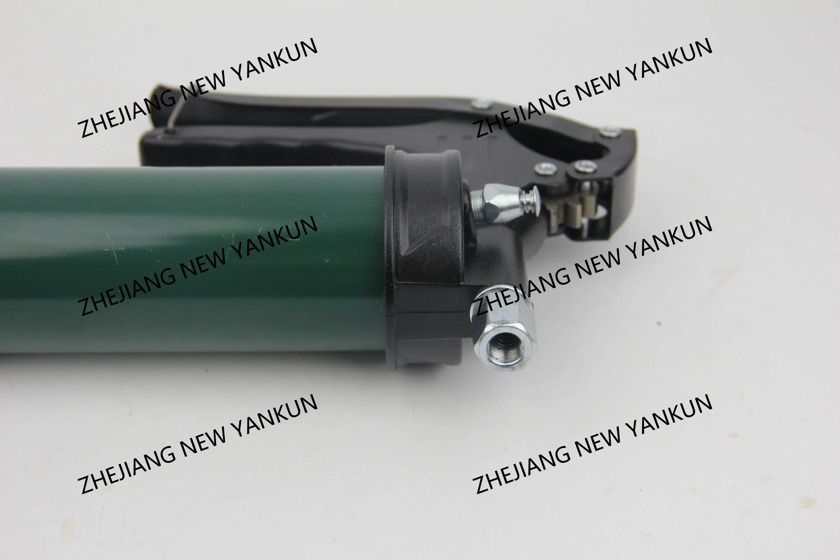 Ручная маслёнка с эргономичной красной ручкой