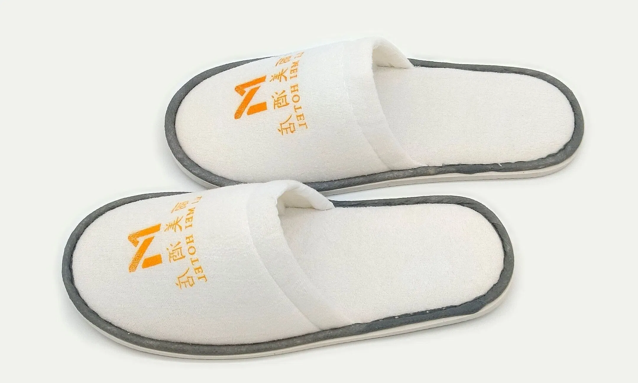 China Manufacturer Velour Velvet Terry Cloth Fabric Disposable Slippers Hotel Cotton Velour Disposable SPA Hotel Travel Slippers Closed / Open Toe with Logo