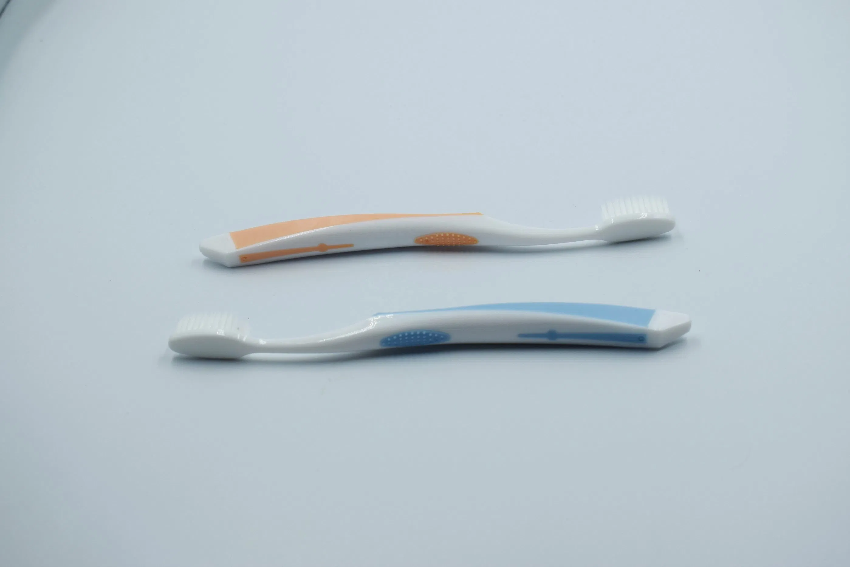 Wholesale Soft Tapered Bristles Toothbrush Colored Adult Plastic Toothbrush for Home Use