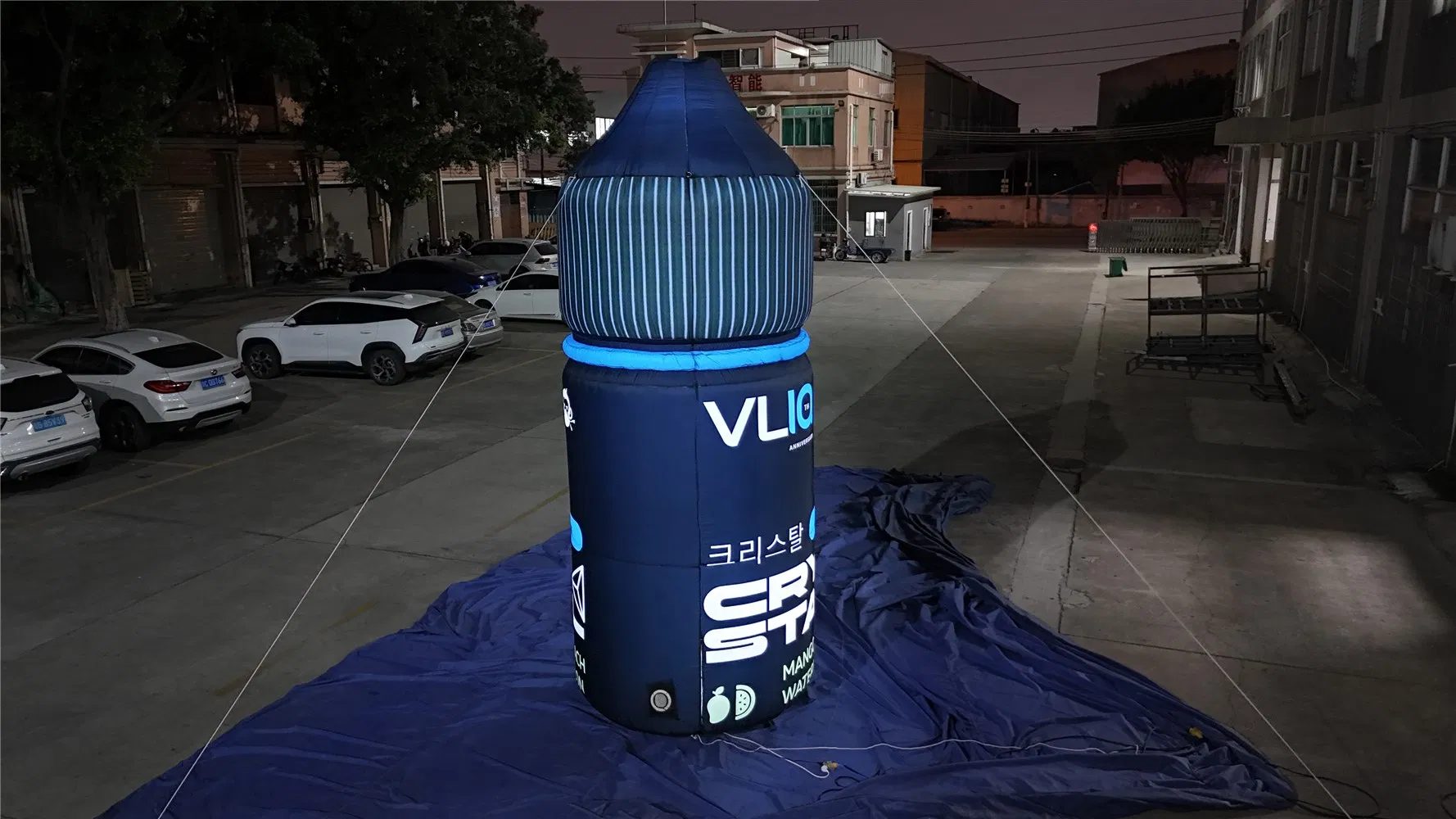 Giant Inflatable Bottle-Shaped Advertisement for Brand and Product Promotion