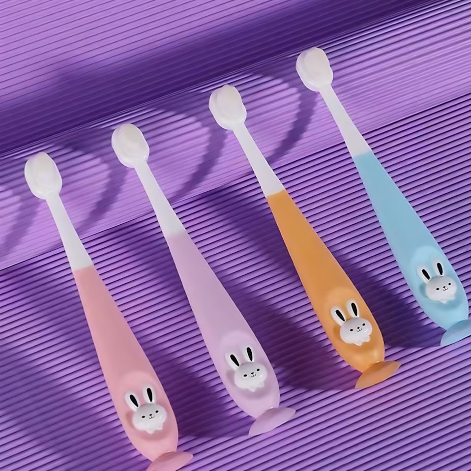 OEM ODM Cute Clover Baffle Silicone Handle Soft Bristle Children's Toothbrush in Green Purple Colors