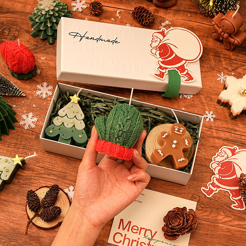 Festive Holiday Candles with Colorful Designs for Gifting