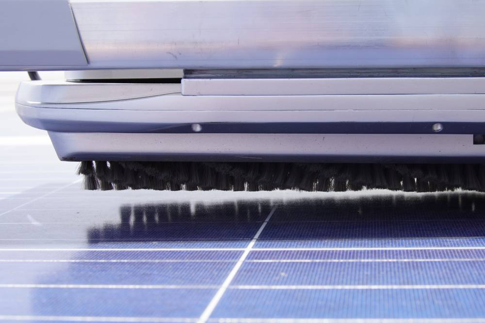 Robot for Solar Panels in Arid Area Applications with Dry-Sweep PV Cleaning Performance