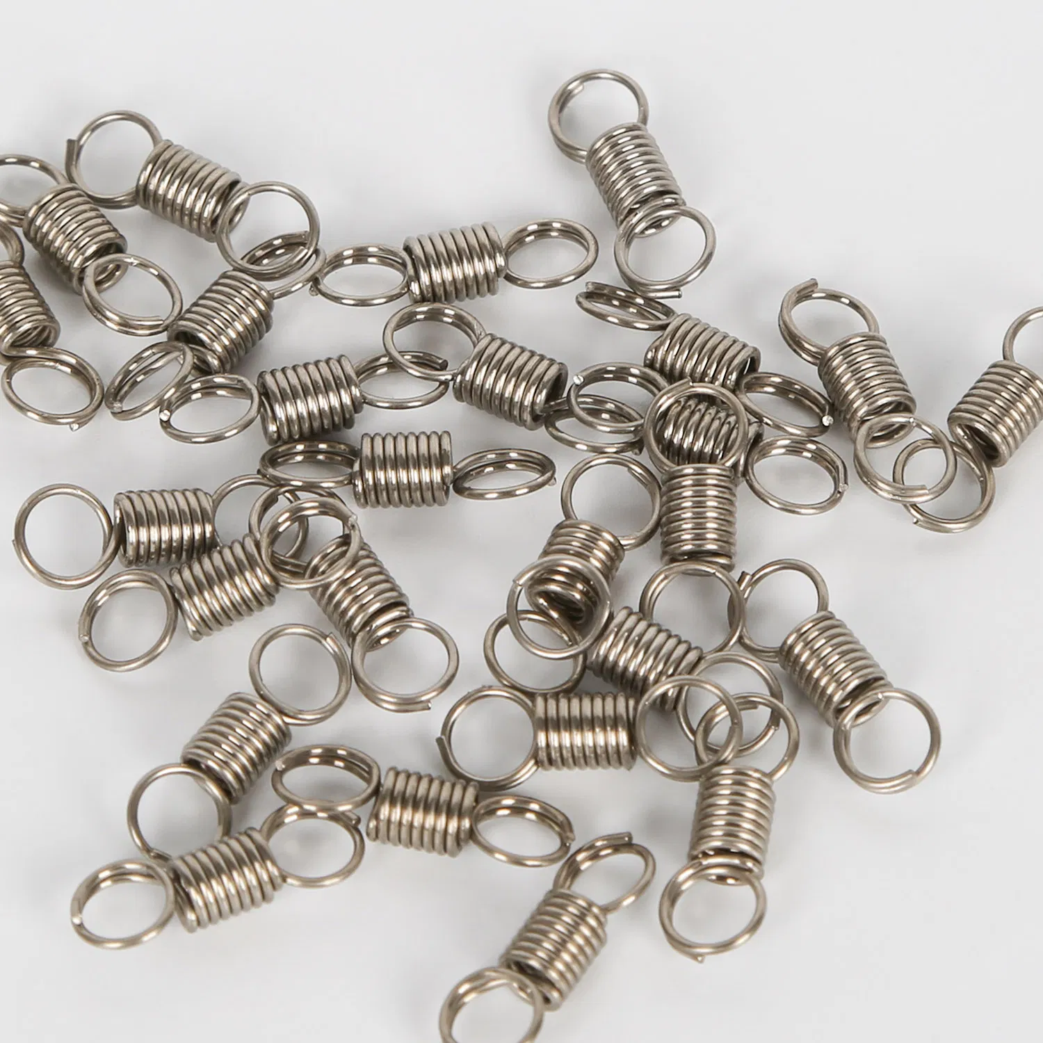 Пружины растяжения и сжатия из нержавеющей стали