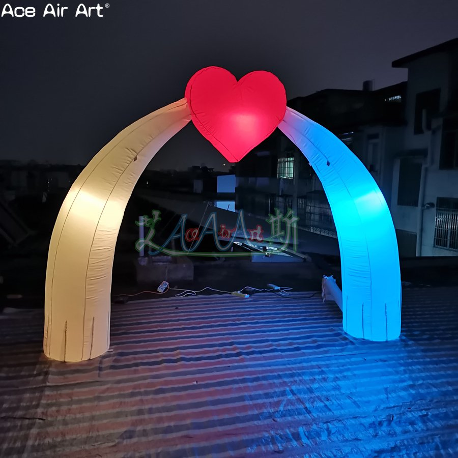 Inflatable Arch with a Heart and Colored LED Lights for Valentine's Day Decoration.