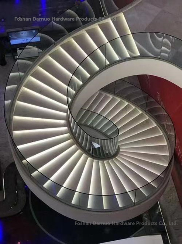 Stylish Indoor Floating Staircase with Curved Wooden Handrail