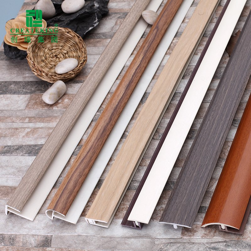 China Factory Hot Selling 40*20mm Q-Shaped Wood-Grain PVC Arc Stair Nosing Profiles