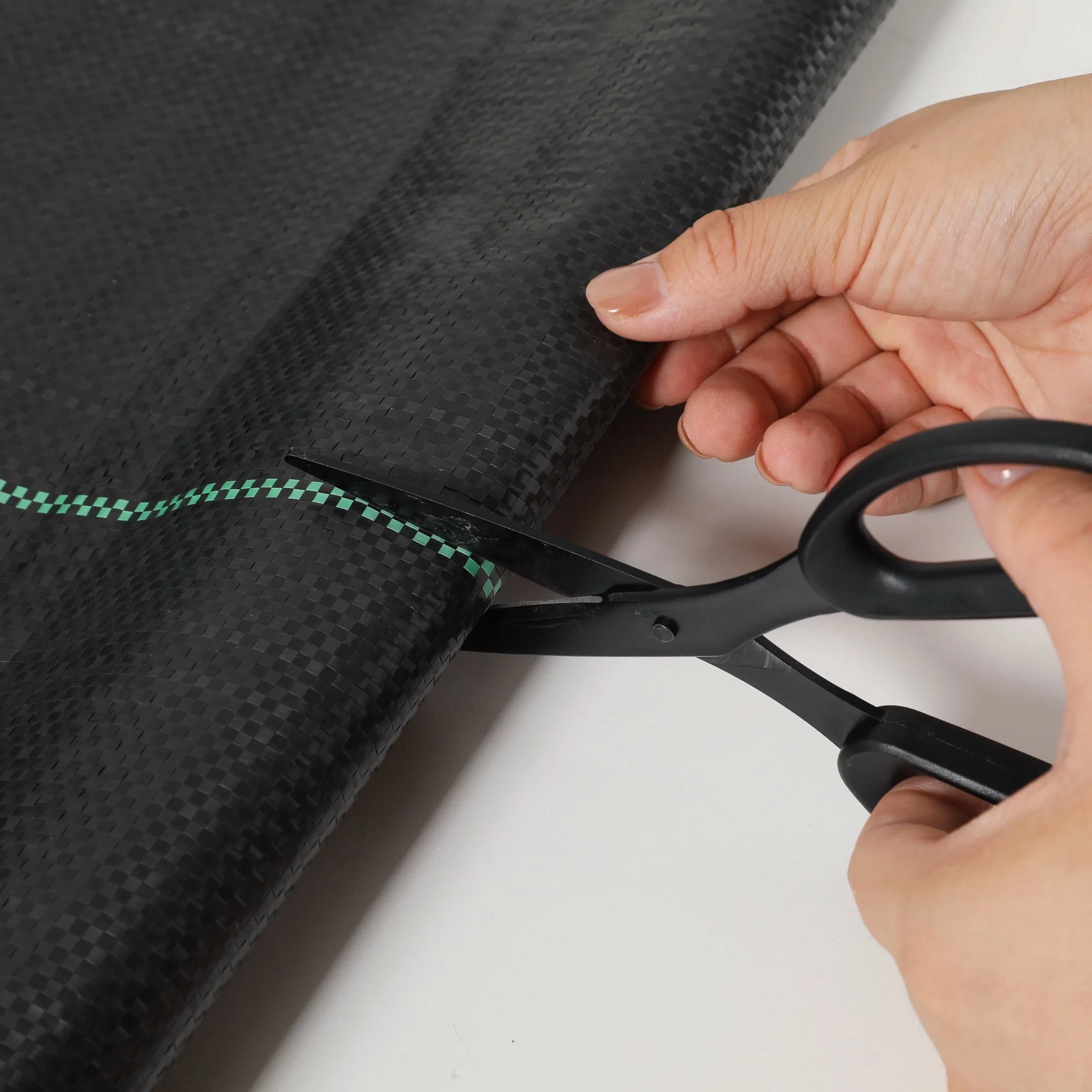 Durable Plastic Ground Cloth for Effective Weed Control