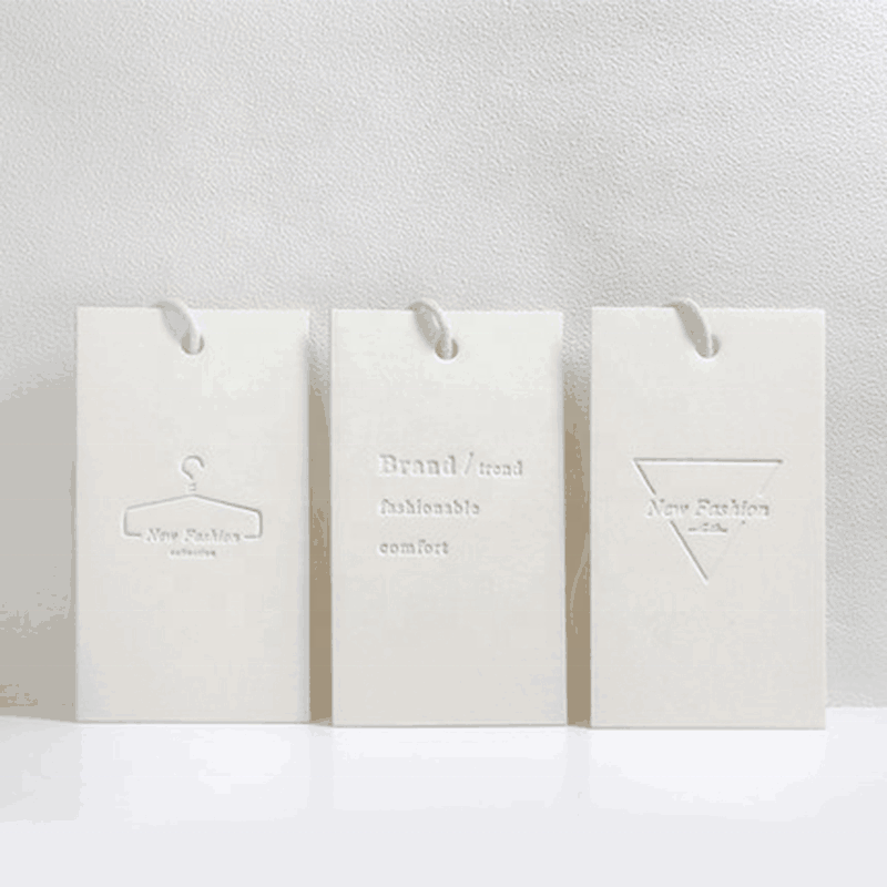 Бирки для одежды с тиснением логотипа