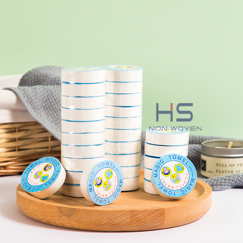 Portable 10PCS/Tube Packing 100% White Spunlace Non-Woven Fabric Round Disposable Magic Compressed Coin Towel Tablets