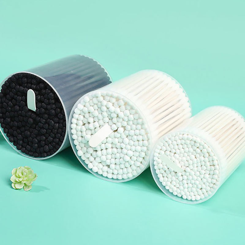 Portable Cotton Swabs with Cardboard Sticks in a Cylindrical Container.