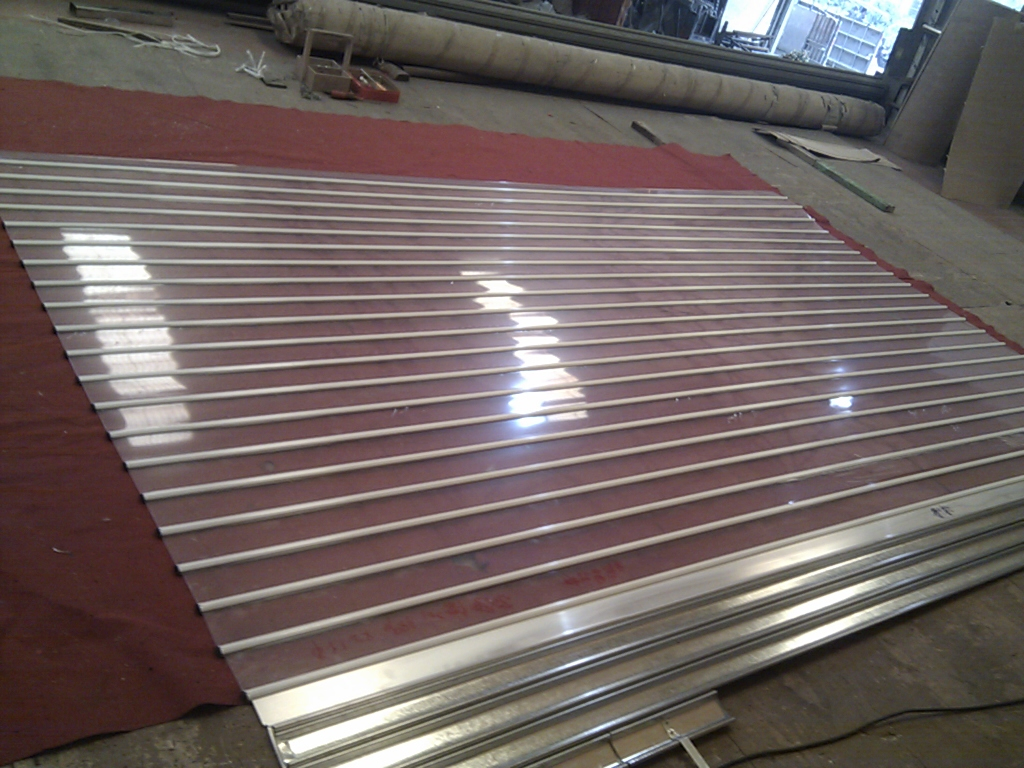 China Transparent Rolling Shutter Door