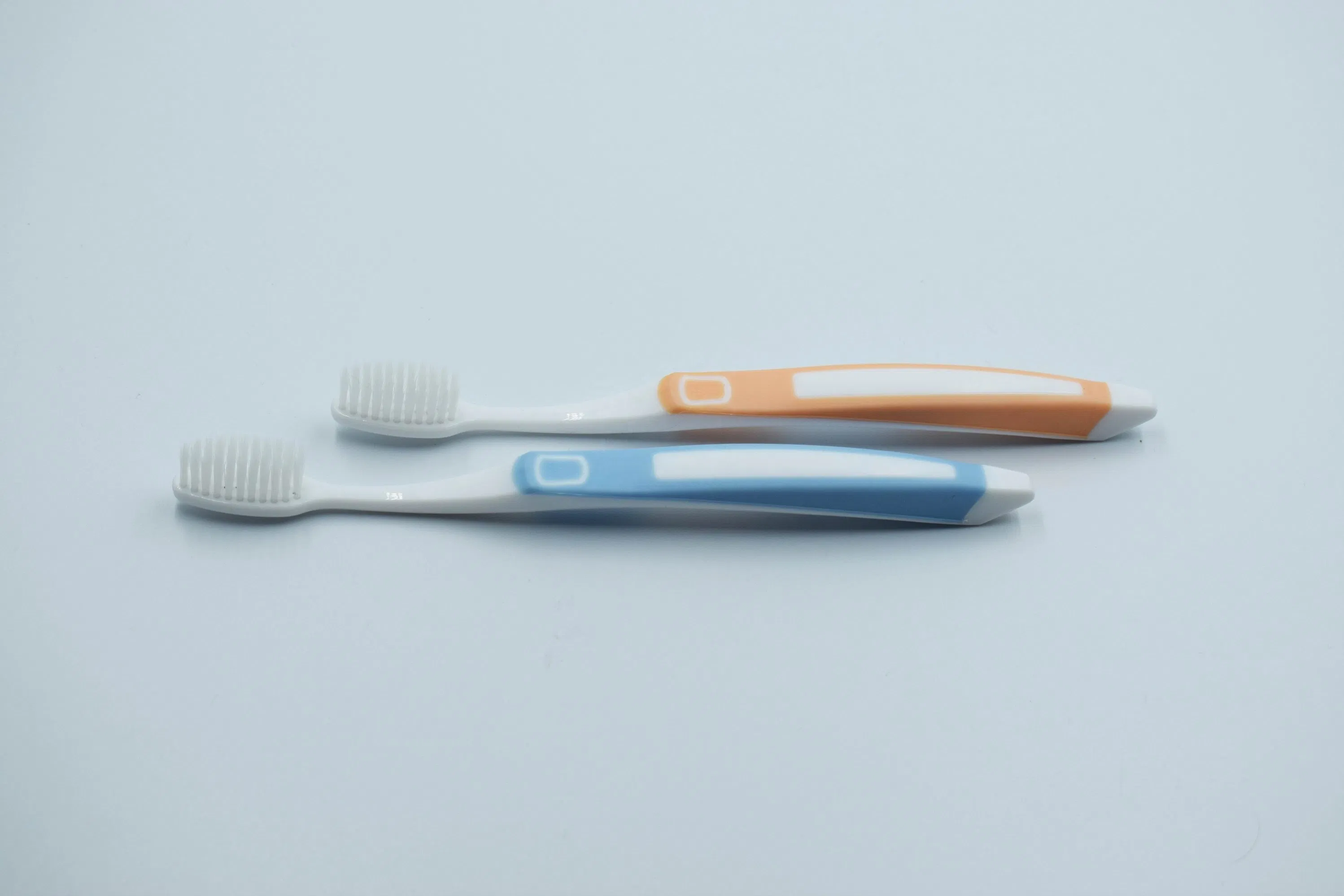 Wholesale Soft Tapered Bristles Toothbrush Colored Adult Plastic Toothbrush for Home Use