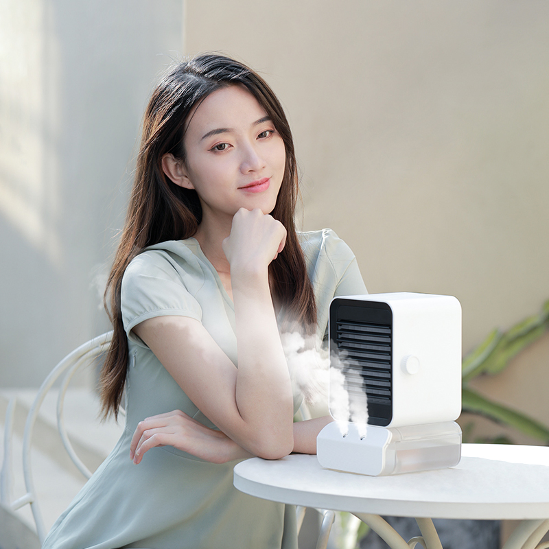 Compact Electric Fan for Instant Cooling and Humidity Control