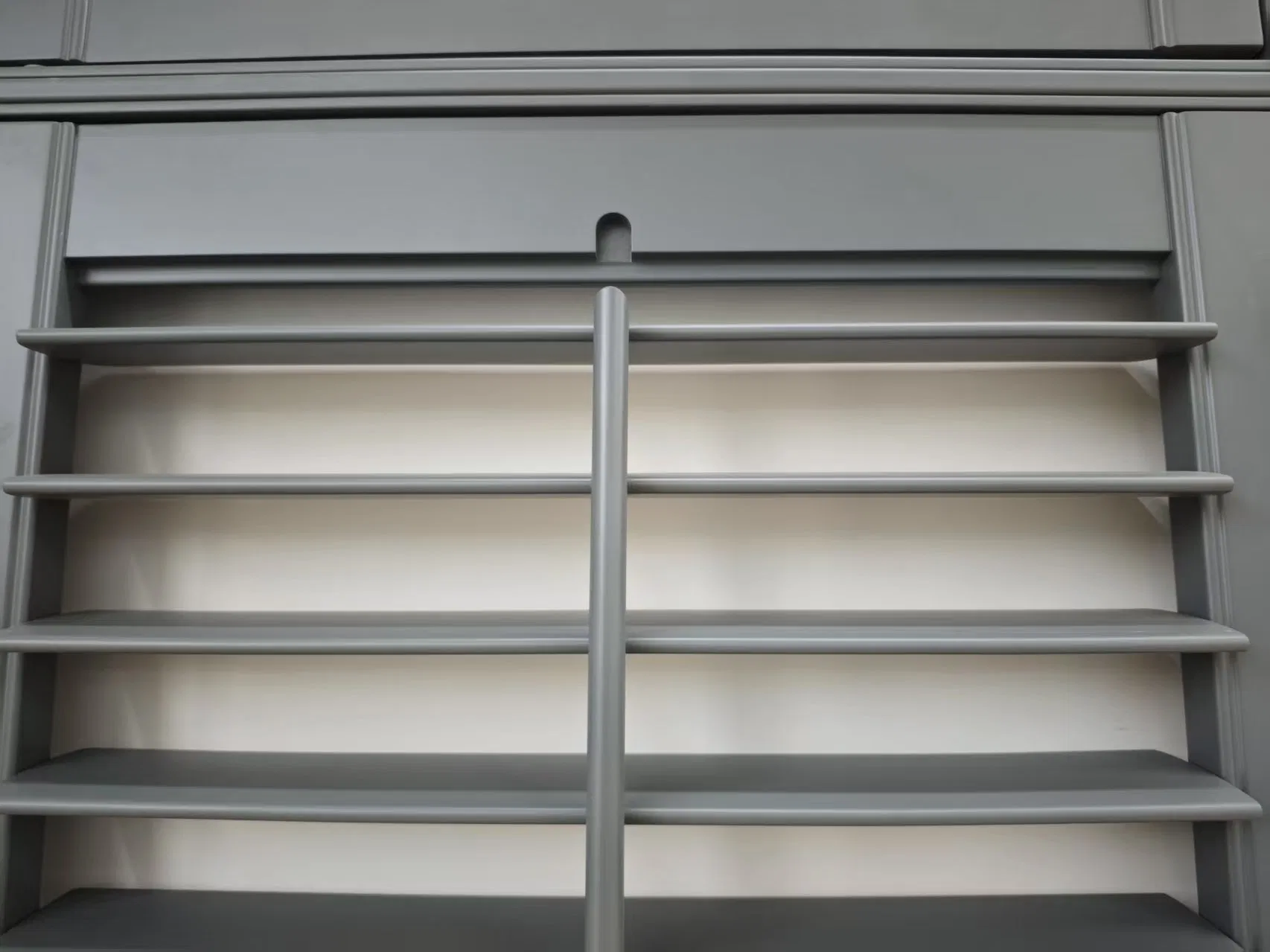 Tier on Tier Window Shutters with a Horizontal Tpost