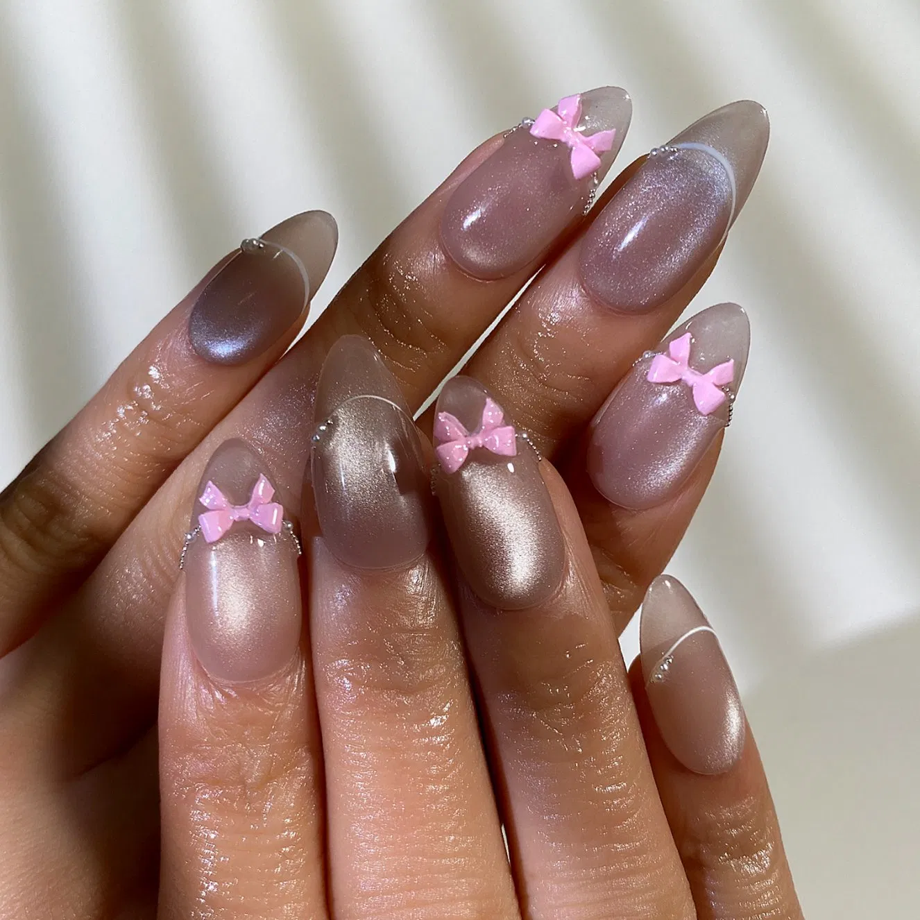 Elegant Pink Bow Press-on Almond Nails with Silver Accents