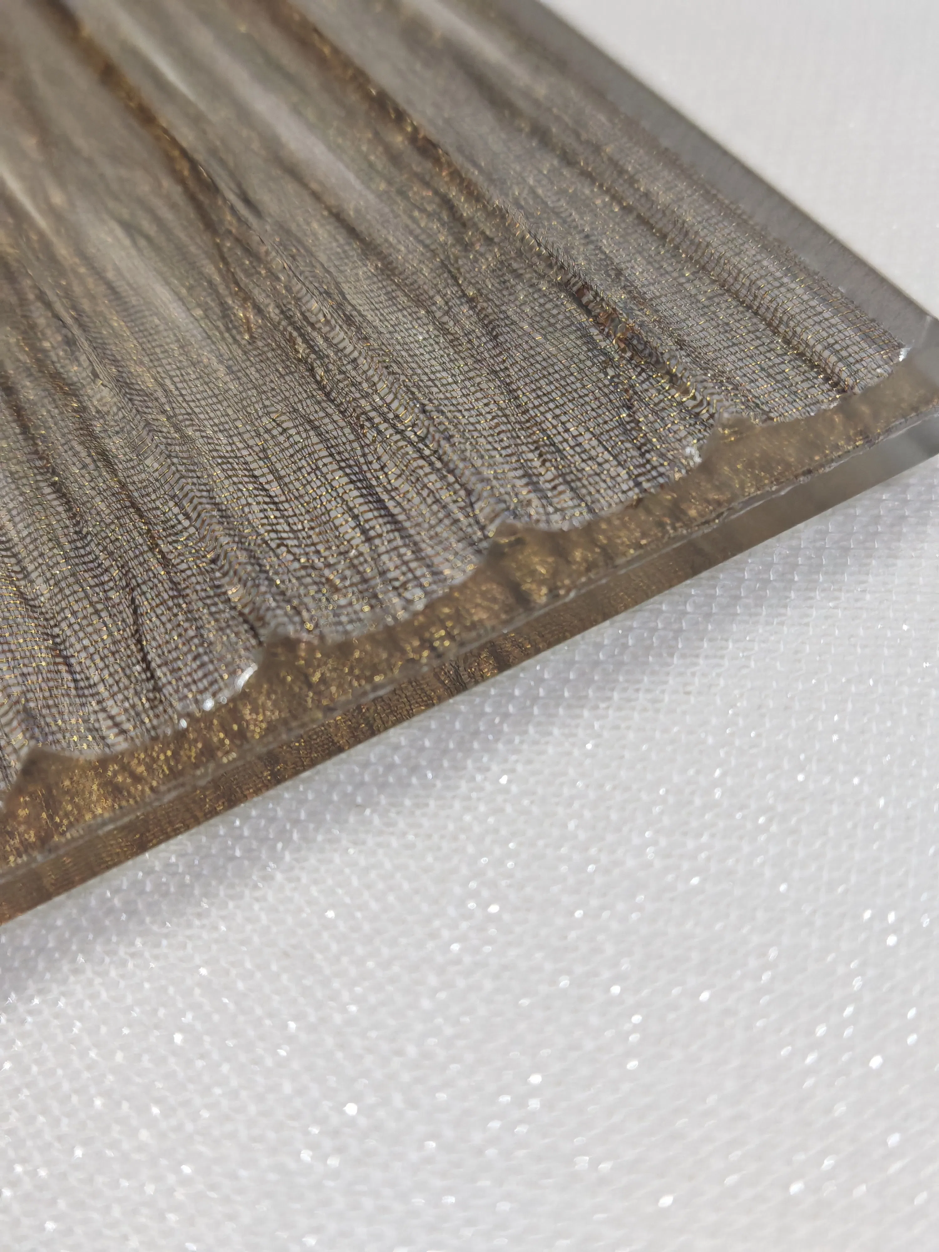 Elegant Laminated Glass Solutions with Decorative Artistic Fabric Design
