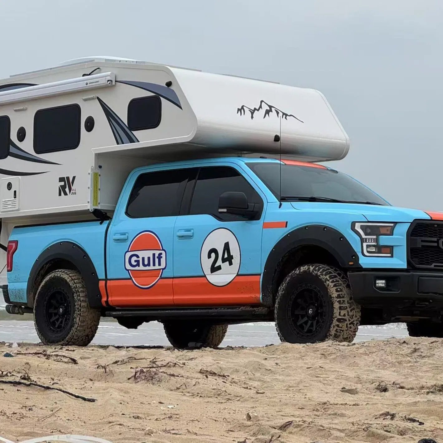 Urban Artist Hard Top Truck Camper Featuring Studio Space with Natural Lighting and Secure Storage
