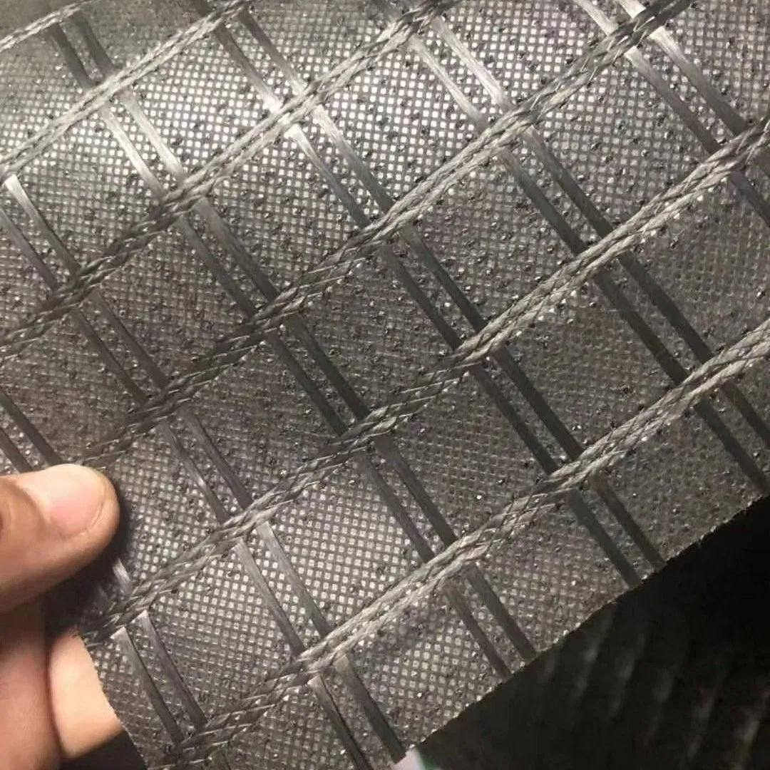 China Factory Building Material Pet Polyester Geogrid for Mining Project Use Fiberglass Material Composite Geogrid