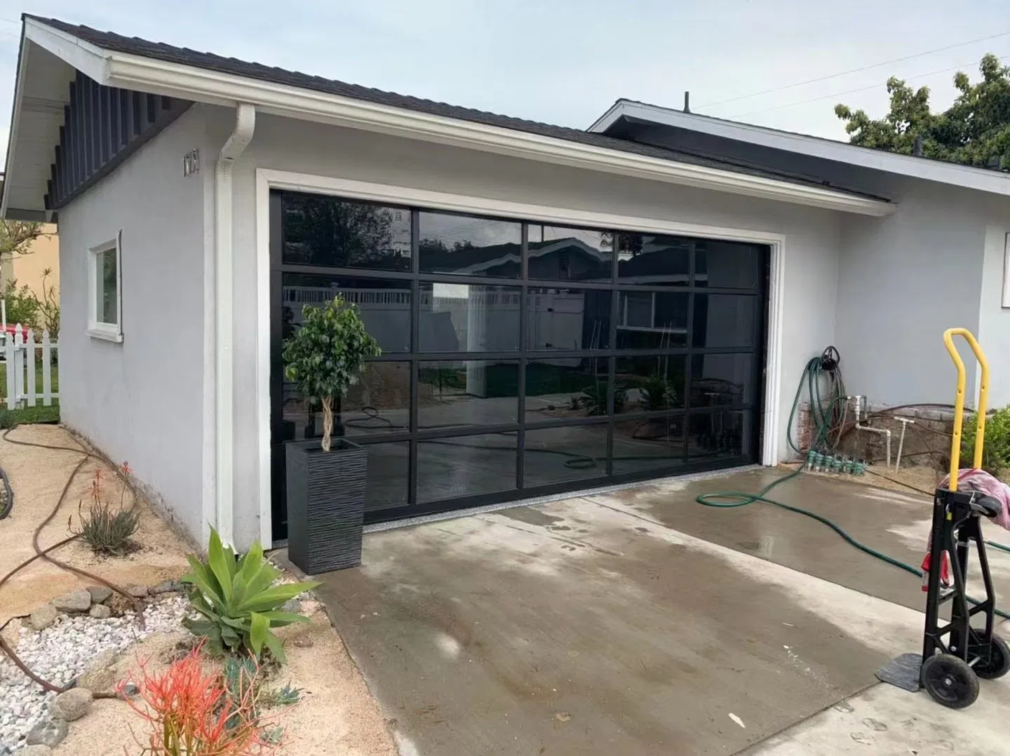 Innovative Glass Garage Doors with Remote Control for Villa Residences
